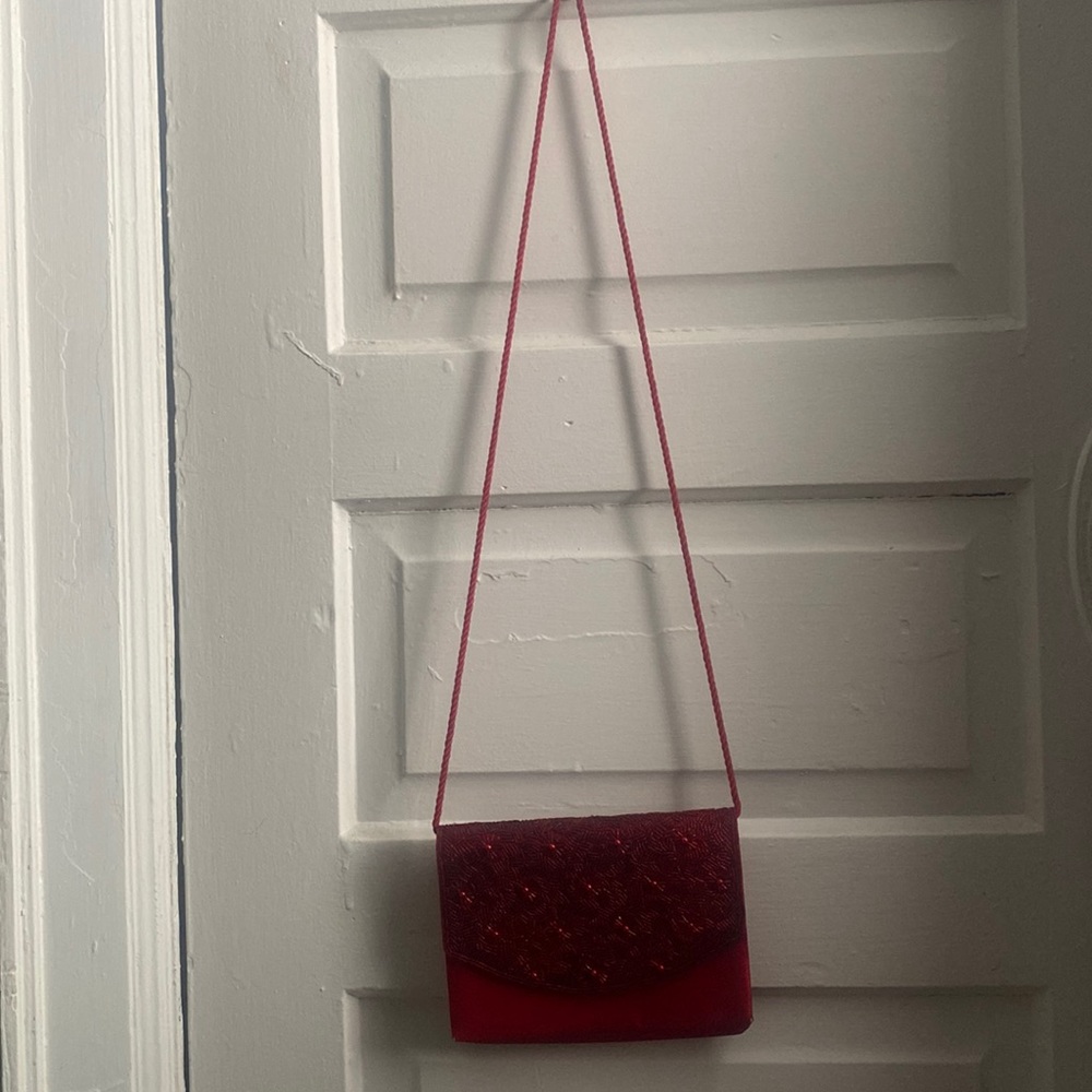 Thrifted red beaded cross body bag.